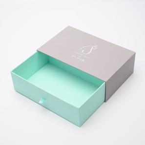 Rigid sliding drawer box packaging with ribbon 